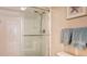 Clean shower with glass enclosure and modern fixtures at 1328 Siesta Bayside Dr # 1328-C, Sarasota, FL 34242