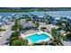 Aerial view of community, pool, and waterway at 1328 Siesta Bayside Dr # 1328-C, Sarasota, FL 34242