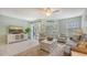 Living room with comfortable seating and TV at 1328 Siesta Bayside Dr # 1328-C, Sarasota, FL 34242