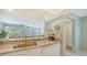 Kitchen features granite countertops and white cabinets at 1328 Siesta Bayside Dr # 1328-C, Sarasota, FL 34242