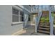 Exterior staircase leading to condo unit at 1328 Siesta Bayside Dr # 1328-C, Sarasota, FL 34242