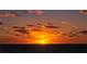Stunning ocean sunset with colorful clouds at 1328 Siesta Bayside Dr # 1328-C, Sarasota, FL 34242
