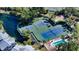 Aerial view of community tennis courts and pool, great amenities! at 1328 Siesta Bayside Dr # 1328-C, Sarasota, FL 34242