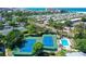 Two well-maintained tennis courts near pool at 1328 Siesta Bayside Dr # 1328-C, Sarasota, FL 34242