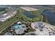Aerial view of community with pool, clubhouse, and homes at 15625 San Lazzaro Ave, Bradenton, FL 34211
