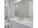 Modern bathroom with white vanity and gold fixtures at 15625 San Lazzaro Ave, Bradenton, FL 34211