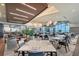 Community clubhouse dining area showcasing stylish tables, place settings, comfortable seating, and scenic views at 15625 San Lazzaro Ave, Bradenton, FL 34211