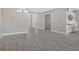 Elegant dining room with hardwood floors and chandelier at 15625 San Lazzaro Ave, Bradenton, FL 34211