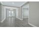 Open entryway with gray tile floors and access to other rooms at 15625 San Lazzaro Ave, Bradenton, FL 34211