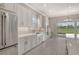 Modern kitchen features stainless steel appliances and white cabinets at 15625 San Lazzaro Ave, Bradenton, FL 34211