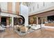 Inviting lobby area with stylish seating, modern fireplace, and elegant decor accents at 15625 San Lazzaro Ave, Bradenton, FL 34211
