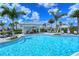 Inviting community pool with lounge chairs and a covered area at 15625 San Lazzaro Ave, Bradenton, FL 34211