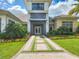 Elegant community clubhouse with landscaped entrance at 15625 San Lazzaro Ave, Bradenton, FL 34211