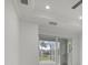 Bright bedroom with sliding glass doors leading to the backyard at 16381 Cape Horn Blvd, Punta Gorda, FL 33955