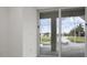 View of a backyard pool and patio from sliding glass doors at 16381 Cape Horn Blvd, Punta Gorda, FL 33955