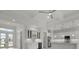 Open-concept kitchen and living area with white cabinets and modern finishes at 16381 Cape Horn Blvd, Punta Gorda, FL 33955