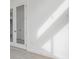 Bright bedroom with mirrored closet doors and hardwood floors at 16381 Cape Horn Blvd, Punta Gorda, FL 33955