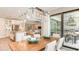 Bright dining room with sliding glass doors leading to outdoor patio at 16443 Star Grass Cir, Bradenton, FL 34211