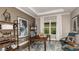 Spacious home office with built-in shelving and large window at 16443 Star Grass Cir, Bradenton, FL 34211