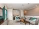 Bright loft area with sectional sofa and built-in cabinets at 16443 Star Grass Cir, Bradenton, FL 34211