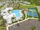 Aerial view of community amenities including pool, playground, and sports courts at 16742 Savory Mist Cir, Bradenton, FL 34211