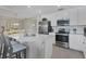 Modern kitchen with stainless steel appliances and an island at 17626 Gawthrop Dr # 201, Bradenton, FL 34211