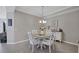Elegant dining area with farmhouse style table and chairs at 17626 Gawthrop Dr # 201, Bradenton, FL 34211