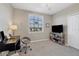Spacious home office with built-in shelving and window at 17626 Gawthrop Dr # 201, Bradenton, FL 34211