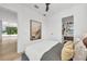Bright bedroom showcasing a large art piece and exterior views at 2038 Datura St, Sarasota, FL 34239