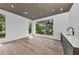Bonus room with large windows, a bar area and stylish ceiling detail at 2038 Datura St, Sarasota, FL 34239
