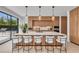 Stylish kitchen with a marble island, modern lighting, and open layout at 2038 Datura St, Sarasota, FL 34239