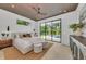 Modern main bedroom featuring a ceiling fan, recessed lighting, and sliding glass doors to the pool area at 2038 Datura St, Sarasota, FL 34239