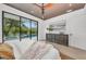 Main bedroom featuring a ceiling fan, recessed lighting, and sliding glass doors to the pool area at 2038 Datura St, Sarasota, FL 34239