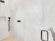 Sleek walk-in shower with rainfall shower head, handheld wand, and recessed niche at 2038 Datura St, Sarasota, FL 34239