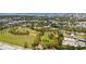 Aerial view of a park with walking paths, playground, and skate park at 2344 Lindstrom St, Sarasota, FL 34237