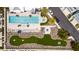 Aerial view of community pool, hot tub, and putting green at 2344 Lindstrom St, Sarasota, FL 34237