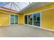 Bright screened balcony with sliding glass doors and a view at 2501 Broad St, Nokomis, FL 34275