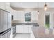 Modern kitchen with stainless steel appliances and granite countertops at 2814 Daphne Rd, North Port, FL 34288