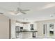 Open concept kitchen with island and stainless steel appliances at 2814 Daphne Rd, North Port, FL 34288
