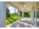 Spacious covered patio overlooking a lush backyard at 2814 Daphne Rd, North Port, FL 34288