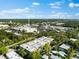 Aerial view showing the property's location near a shopping center at 3700 S Osprey Ave # 214, Sarasota, FL 34239