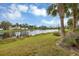 Tranquil lake view with lush green landscape at 4523 Cinnamon Dr # 2702, Sarasota, FL 34238