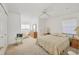 Spacious bedroom with a dresser and a cozy seating area at 5331 Siesta Cove Dr, Sarasota, FL 34242