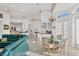 Open concept kitchen with breakfast nook and glass-top table at 5331 Siesta Cove Dr, Sarasota, FL 34242