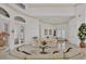 Spacious living room with multiple seating areas, offering a bright and airy atmosphere at 5331 Siesta Cove Dr, Sarasota, FL 34242