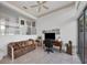 Bright home office features a comfortable sofa and built-in desk at 5331 Siesta Cove Dr, Sarasota, FL 34242