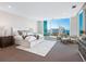 Primary bedroom with stunning water views and city skyline at 540 N Tamiami Trl # 1201, Sarasota, FL 34236