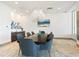 Private dining room with a large table and modern chairs at 540 N Tamiami Trl # 1201, Sarasota, FL 34236
