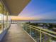 Spacious balcony with panoramic sunset and city views at 540 N Tamiami Trl # 1201, Sarasota, FL 34236