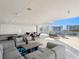 Modern rooftop lounge with comfortable seating and stunning city views at 540 N Tamiami Trl # 1201, Sarasota, FL 34236